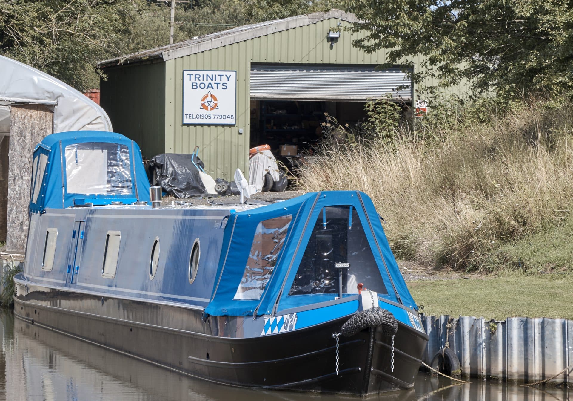 'Master H' custom barge new boat build docked